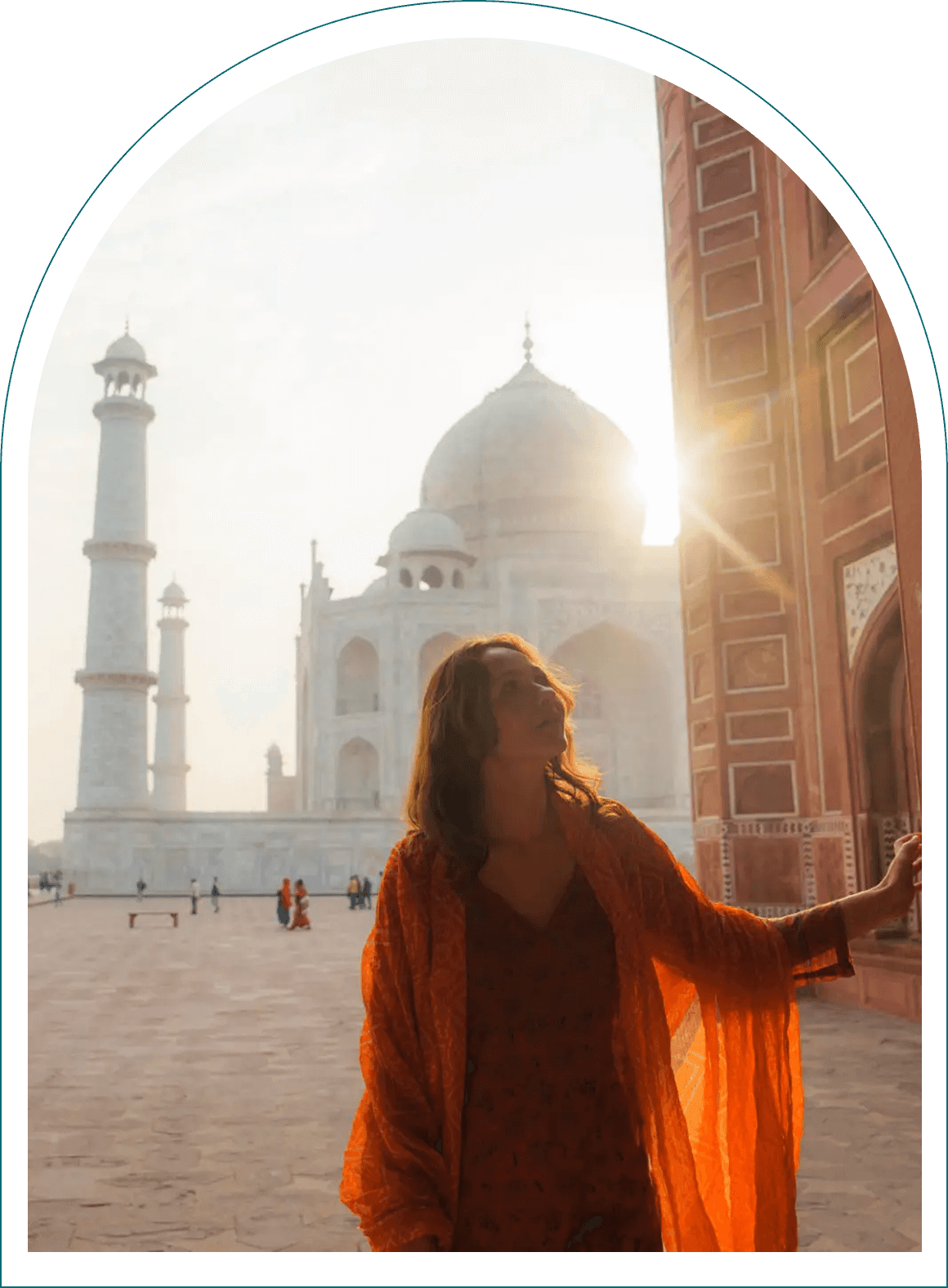 Tourist standing by Taj Mahal entrance