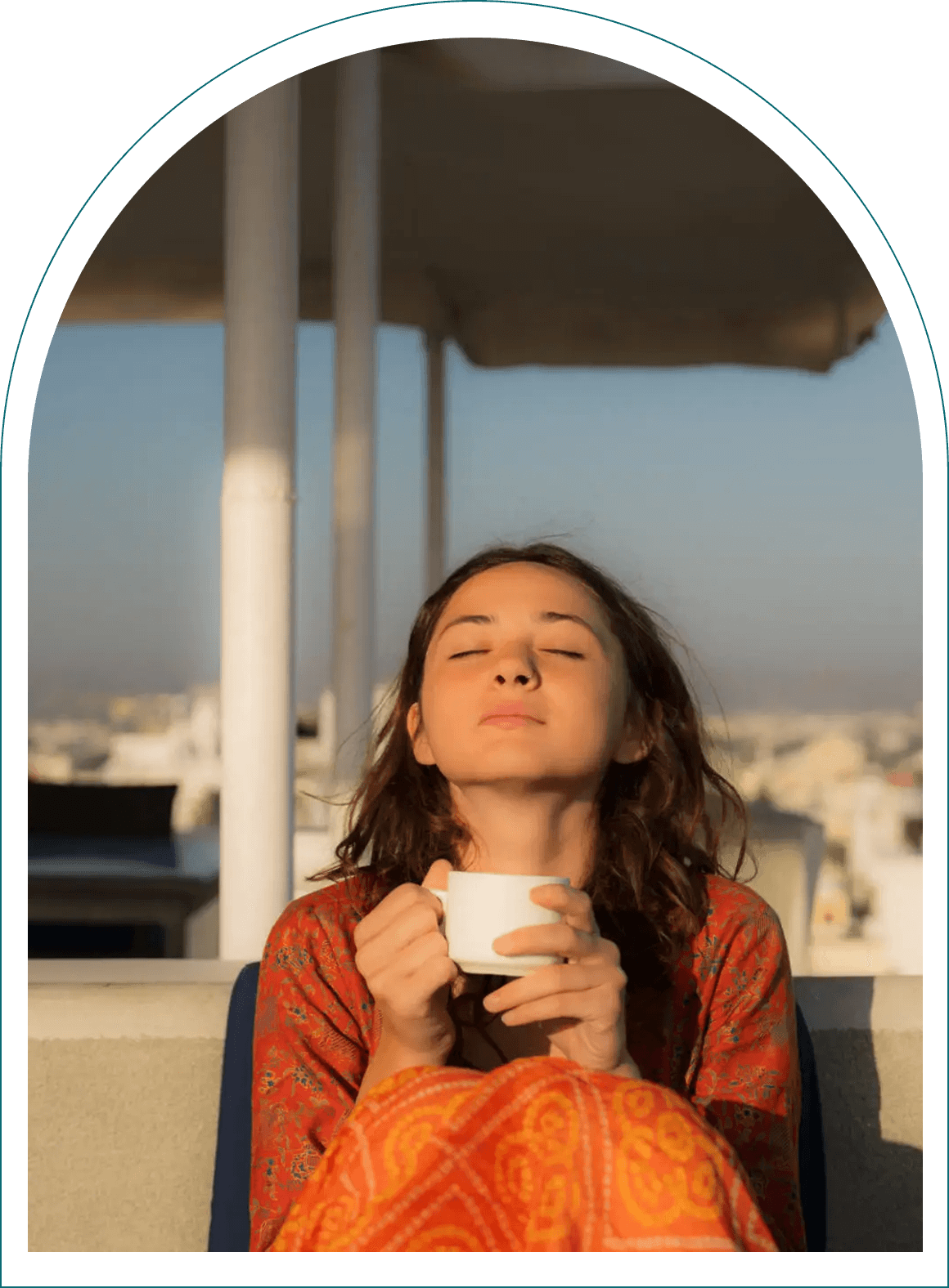 Relaxed woman with cup in sunlight